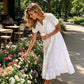 Elegante damesjurk met V-hals en korte mouwen